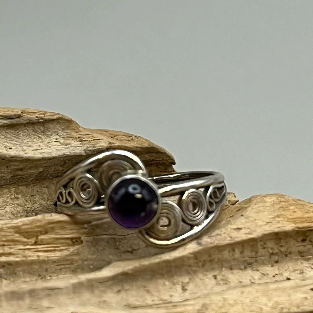 Elegant Sterling Silver and Purple Amethyst Swirl Ring